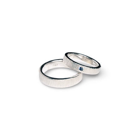 His & Hers Wedding Bands in Sterling Silver with Blue Sapphire