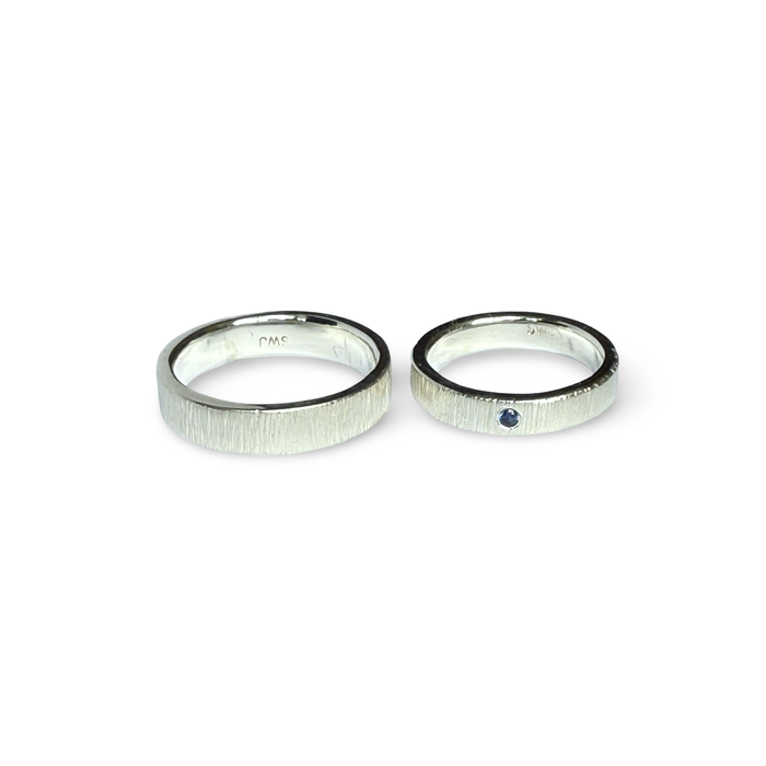 His & Hers Wedding Bands in Sterling Silver with Blue Sapphire